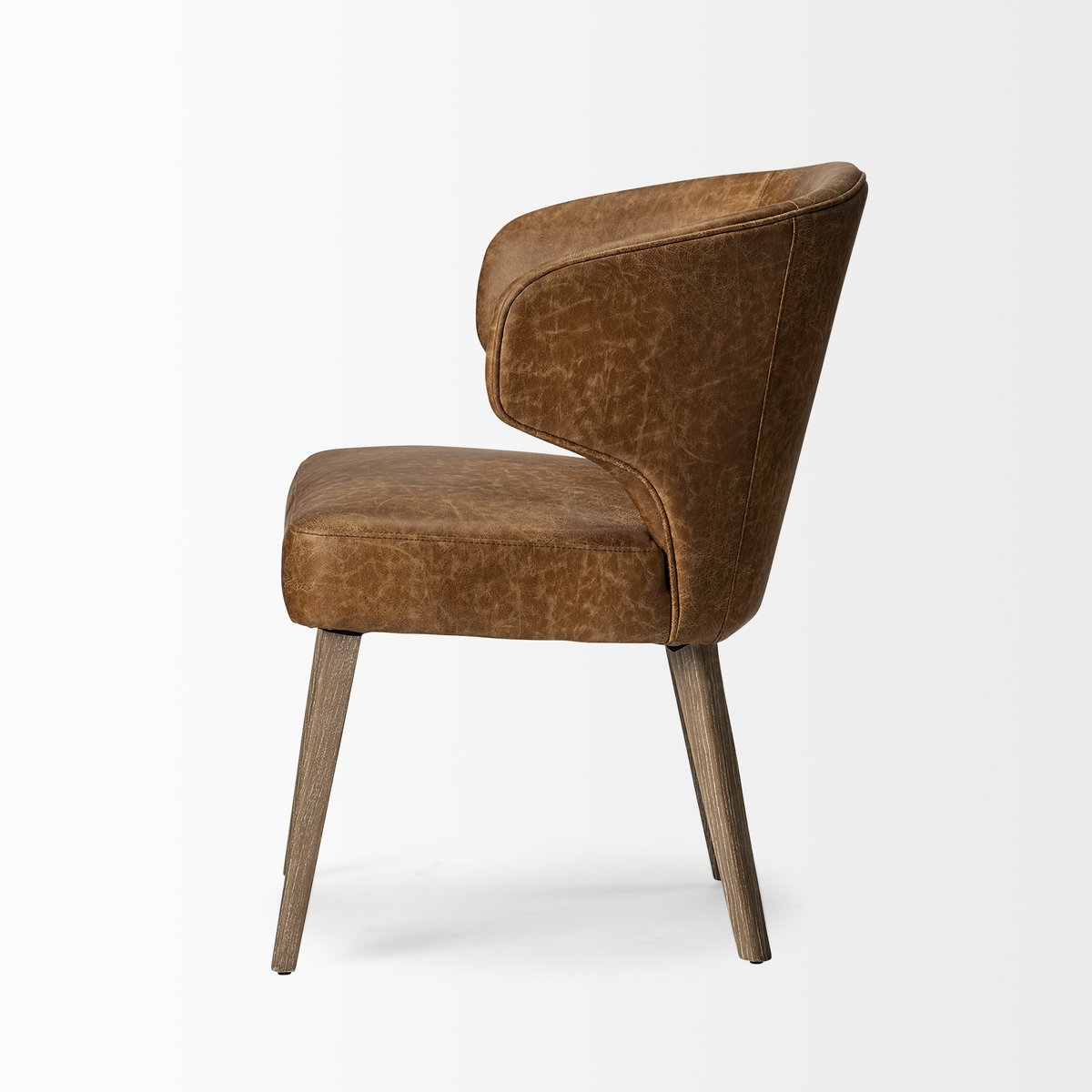 Niles  Brown Faux Leather Seat with Brown Wooden Legs Wingback Dining Chair, by Mercana, 22.5" length x 24" width x 32" height View 4