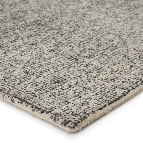 Oland Handmade Solid Cream/ Black Area Rug