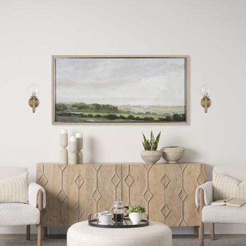 Britton Gold Metal with Clear Glass Globe 1-Light Wall Sconce