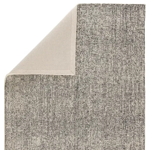 Oland Handmade Solid Cream/ Black Area Rug