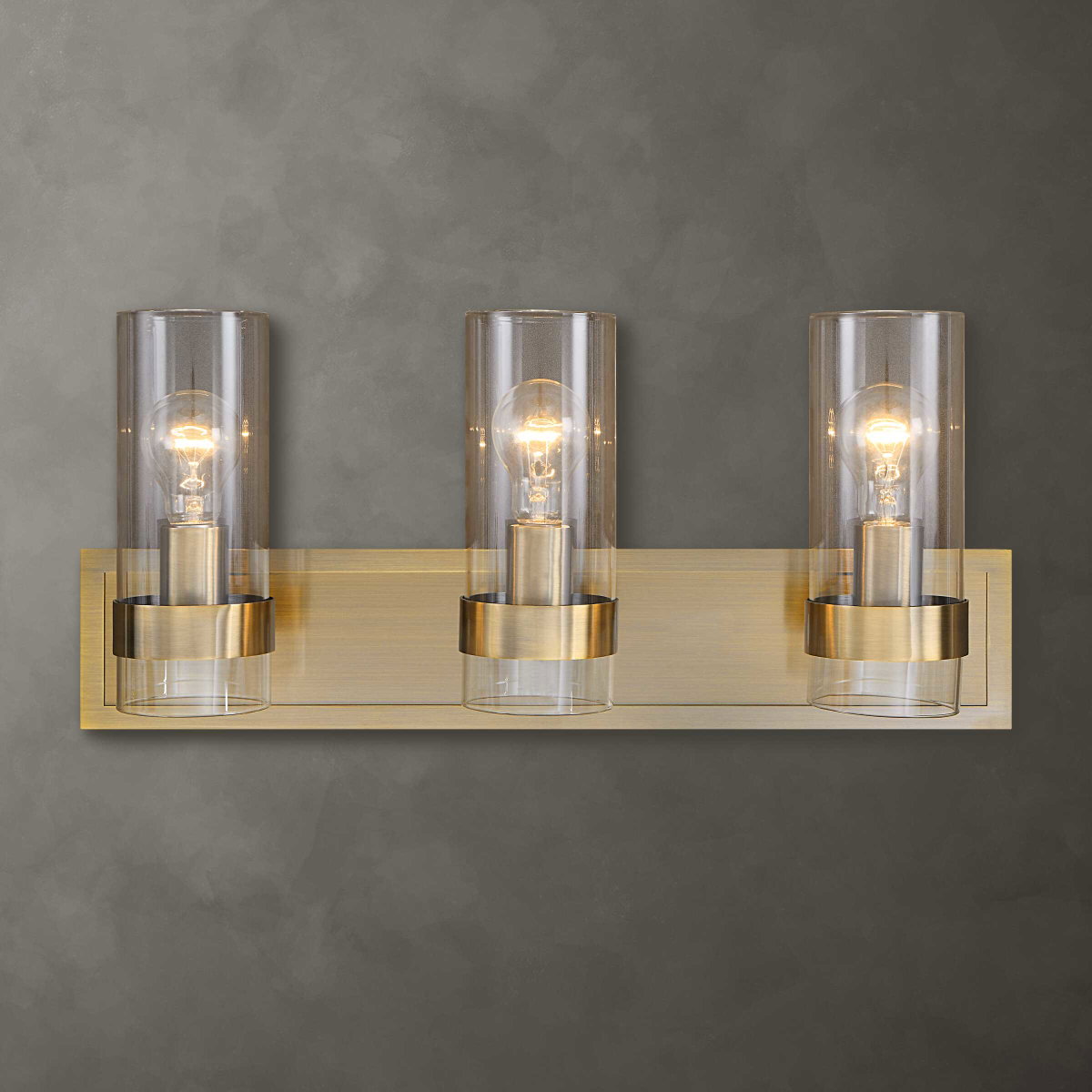 Cardiff Antique Brass 3 Light Vanity, Sconce by Uttermost, 23" width x 10.12" height x 5.75" depth View 1